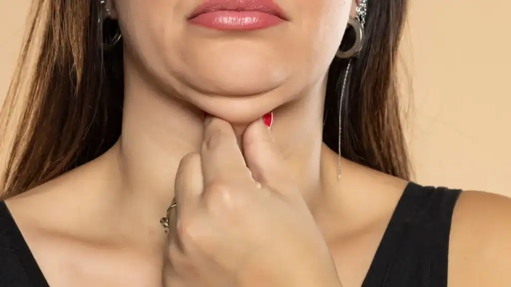 An image of a woman with double chin, sad, worried : Non Surgical Double Chin Removal Treatment in Cookham, UK